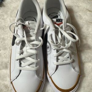 Nike White Sneakers with Gold Trim